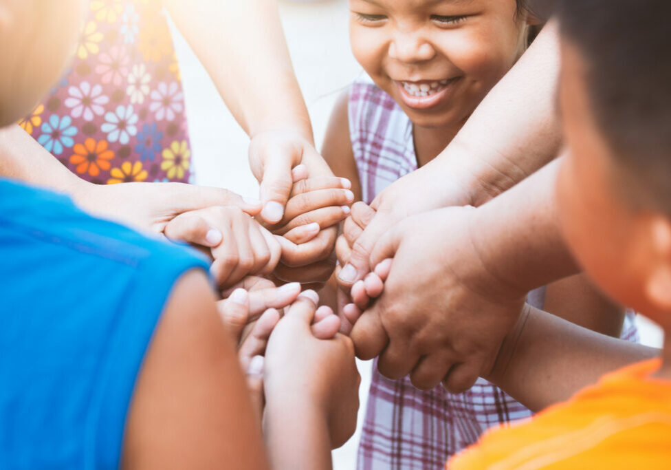 Children having fun and holding hands